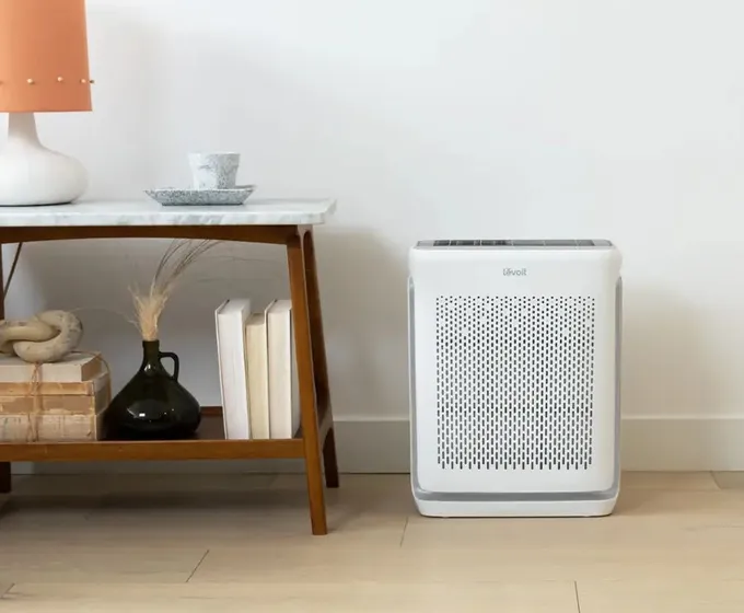 Levoit Vital 200S-P air purifier styled in a home living room setting